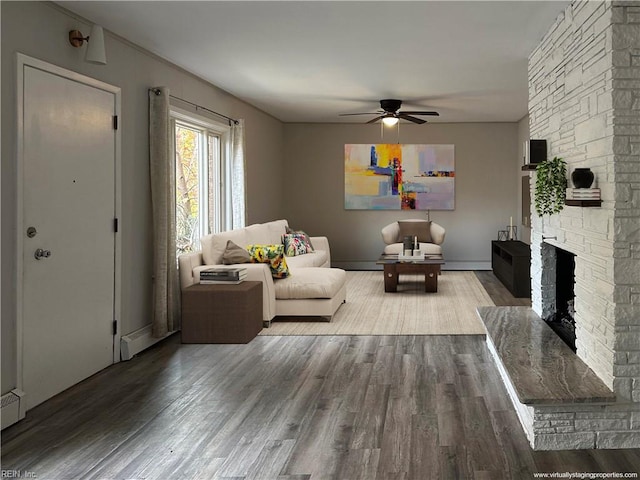 1049 Brandon Ave, Norfolk, VA 23507 - living area with a ceiling fan, wood finished floors, a fireplace, and a baseboard radiator