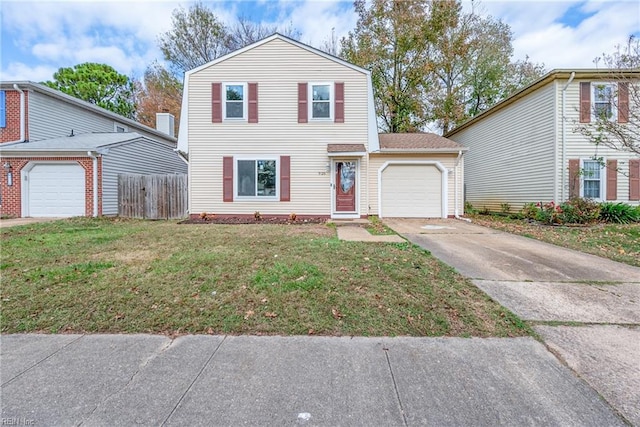 view of front of house with a garage and a front yard