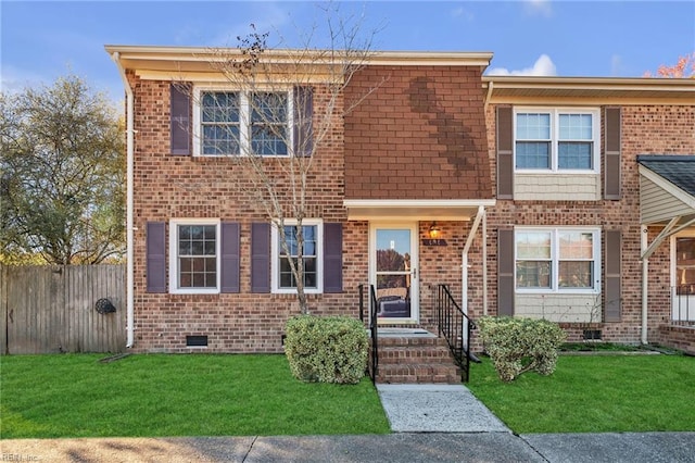 view of front facade with a front yard