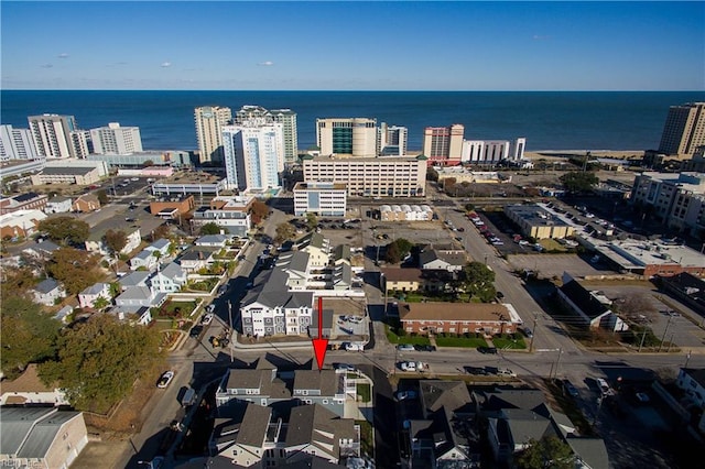 drone / aerial view with a water view