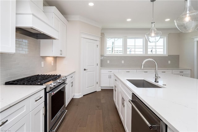 kitchen featuring custom exhaust hood, crown molding, dark hardwood / wood-style flooring, white cabinetry, and stainless steel appliances