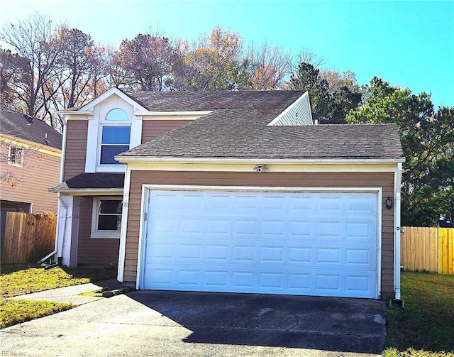 exterior space with a garage