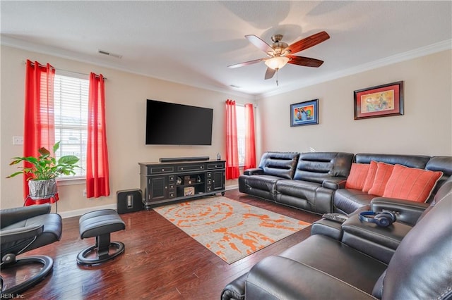 living room featuring hardwood / wood-style flooring, ceiling fan, and ornamental molding