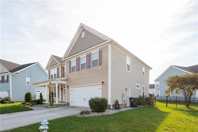 view of front of house featuring a garage and a front lawn