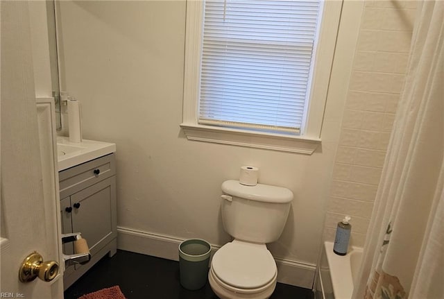 full bathroom with vanity, toilet, and shower / tub combo with curtain