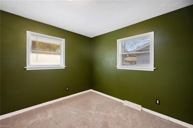 view of carpeted spare room