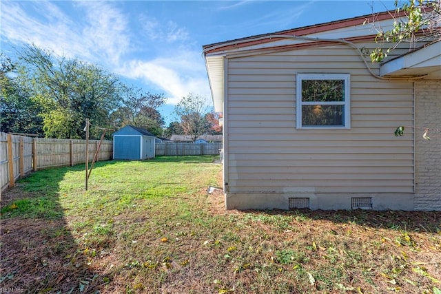 view of yard with a storage shed