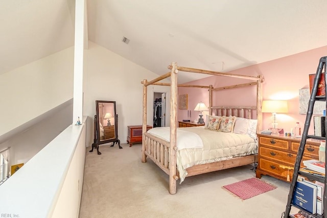 bedroom with light carpet and vaulted ceiling