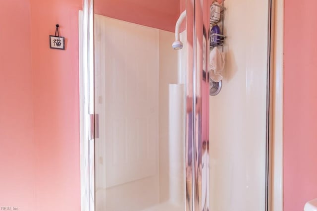 bathroom featuring walk in shower