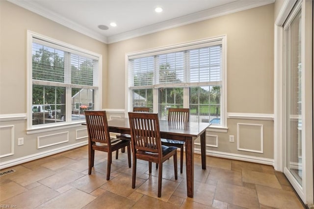 dining room with crown molding