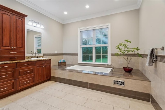 bathroom with vanity, tile patterned floors, ornamental molding, and tiled tub