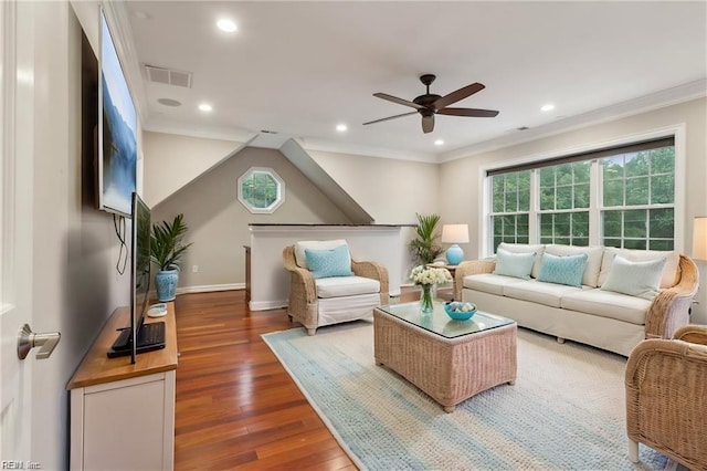 living room with wood-type flooring, ceiling fan, and ornamental molding