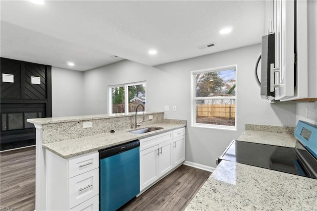 kitchen featuring sink, white cabinets, a healthy amount of sunlight, and appliances with stainless steel finishes