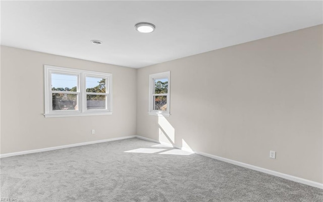 spare room featuring carpet floors