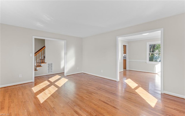 unfurnished room featuring light wood-type flooring