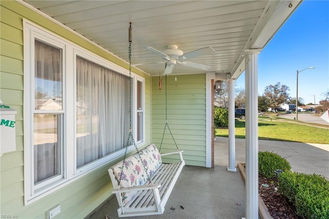 view of patio with a porch and ceiling fan