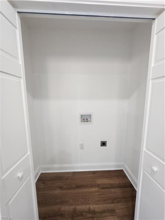 washroom with hookup for an electric dryer, dark wood-type flooring, and hookup for a washing machine