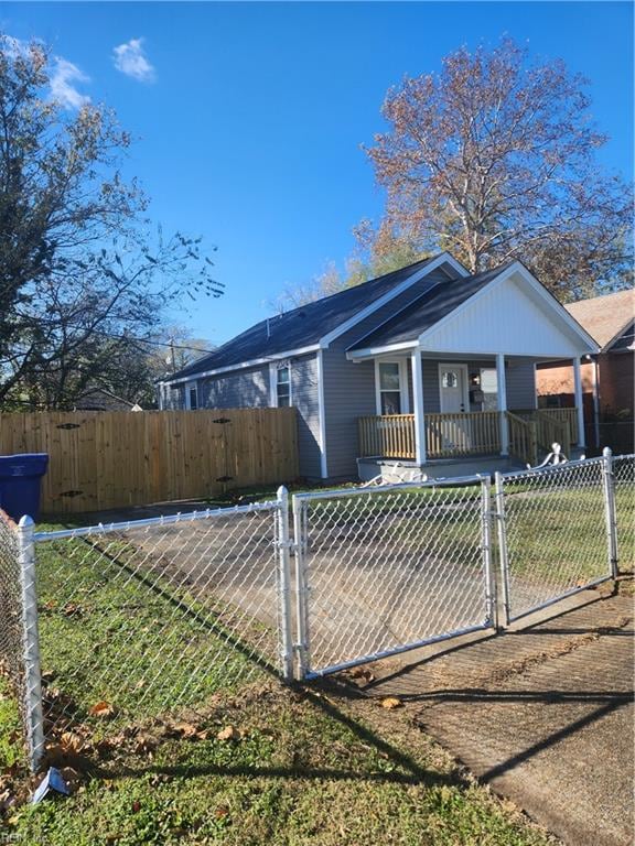 single story home with a porch