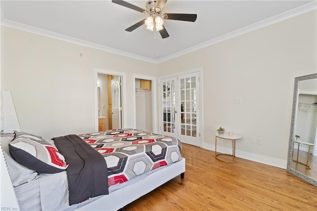 bedroom with ensuite bathroom, hardwood / wood-style floors, ceiling fan, and ornamental molding