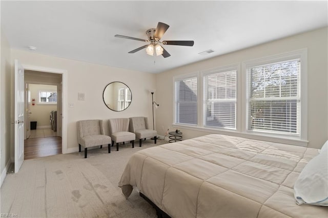 bedroom featuring ceiling fan and light wood-type flooring