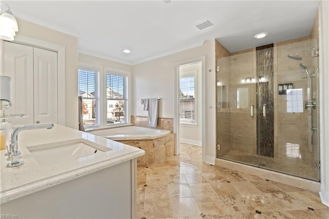 bathroom featuring separate shower and tub, vanity, and ornamental molding