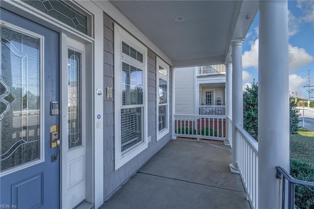 balcony featuring a porch