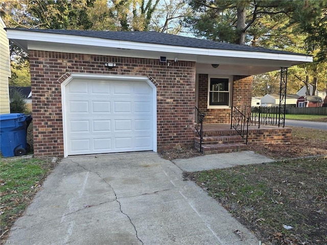 view of front of house featuring a porch and a garage