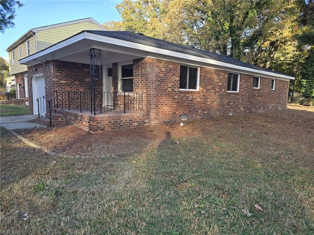 view of front of home featuring a porch and a garage