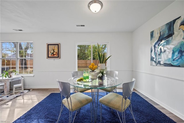 dining room featuring hardwood / wood-style flooring