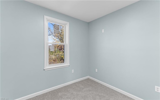 unfurnished room with carpet