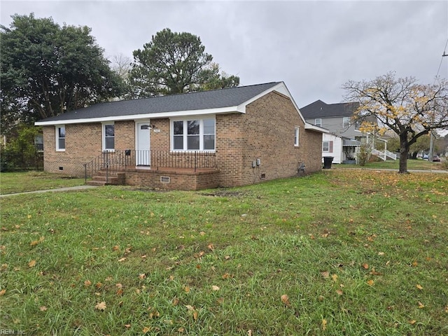 ranch-style home with a front yard