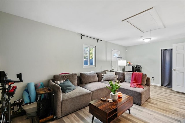 living room with light hardwood / wood-style floors