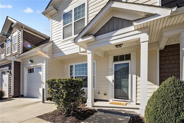 doorway to property featuring a garage