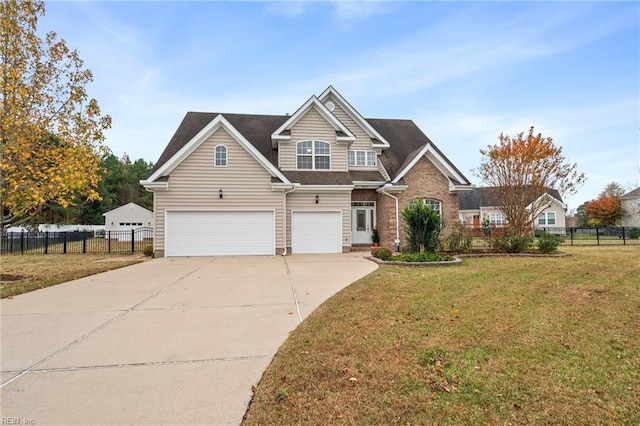 view of front of house with a garage and a front yard