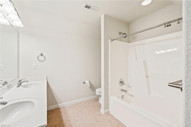 full bathroom with tile patterned floors, vanity,  shower combination, and toilet