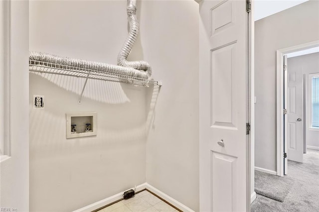 laundry room featuring light carpet and washer hookup