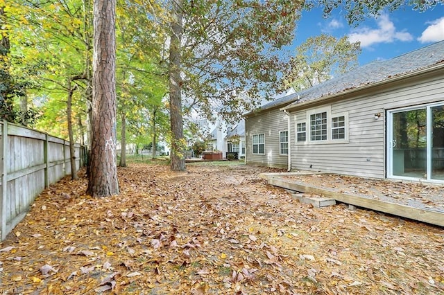 view of yard with a wooden deck