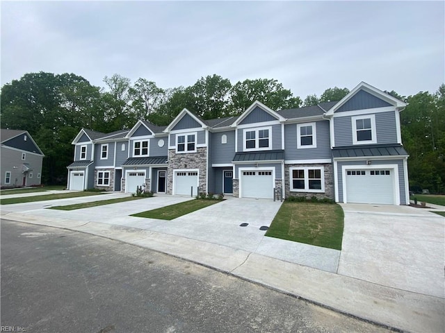 multi unit property featuring a garage