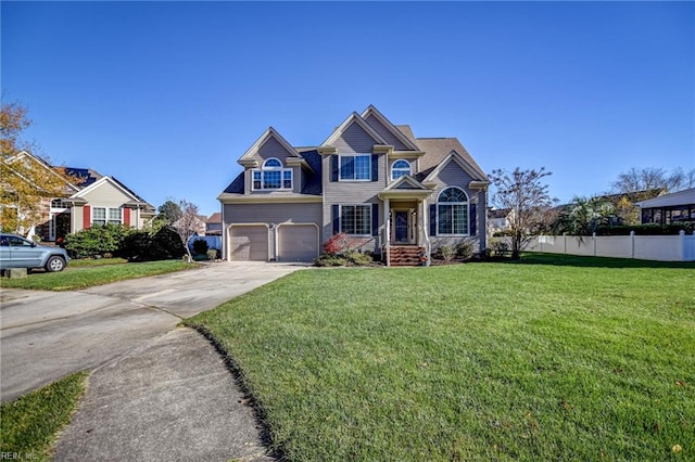 view of front of property with a front lawn and a garage