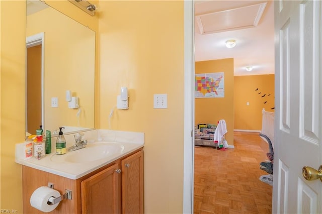 bathroom featuring vanity and parquet floors