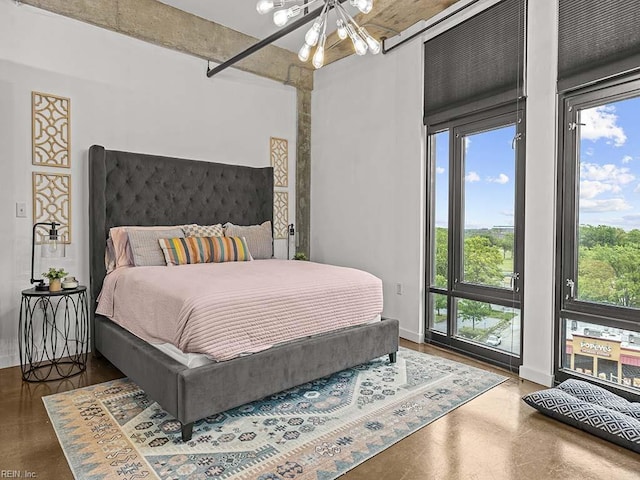 bedroom featuring a chandelier