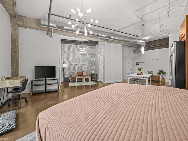 bedroom with stainless steel refrigerator and concrete flooring