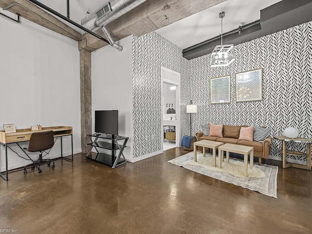 living room with a high ceiling