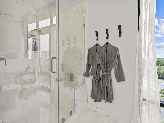 bathroom with an enclosed shower