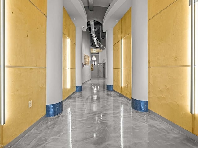 corridor with concrete floors