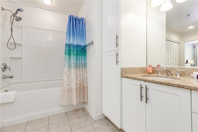 bathroom with shower / bath combination with curtain, vanity, and tile patterned floors