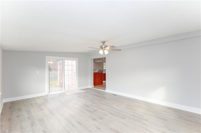 unfurnished room featuring ceiling fan and light hardwood / wood-style flooring