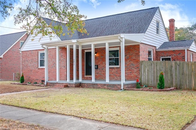 view of front of home with a front yard