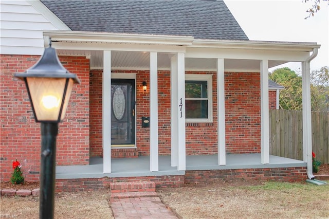 entrance to property with a porch