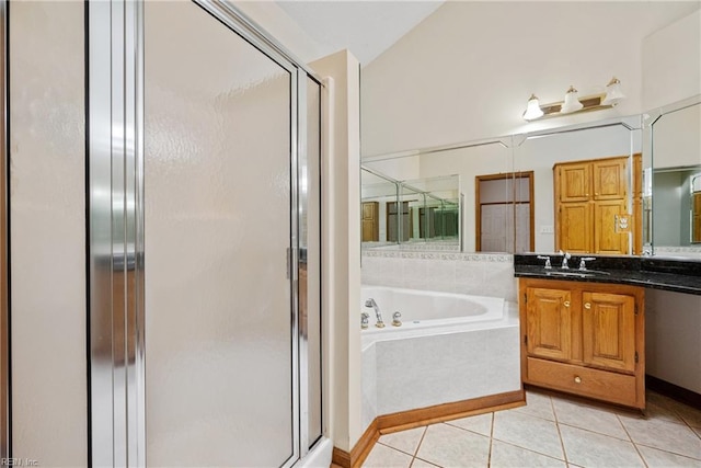 bathroom featuring tile patterned flooring, vanity, and independent shower and bath